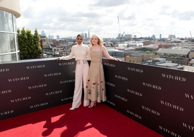dakotafanningdaily-thewatchedphotocallinlondon-001.jpg