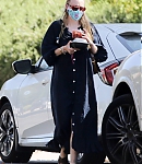 dakotafanningdaily-arrivingatherhomeinlosangeles-040.jpg