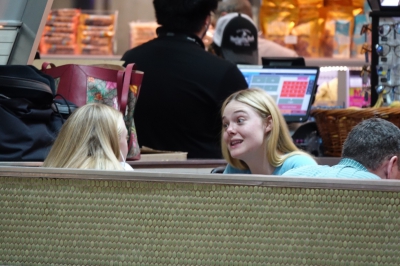 dakotafanningdaily-attheairportinmiami-007.jpg