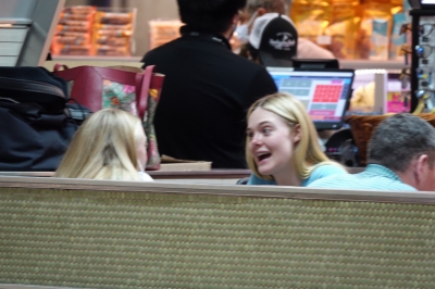 dakotafanningdaily-attheairportinmiami-018.jpg